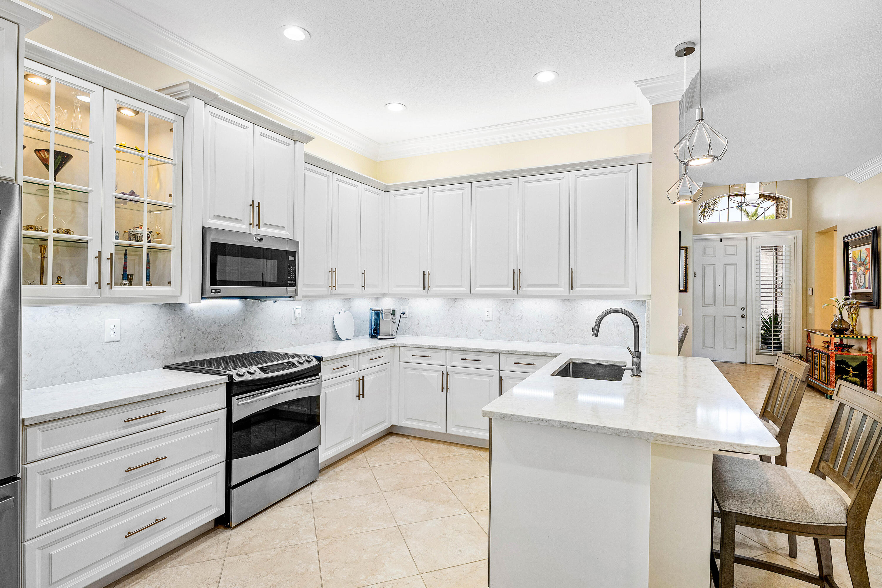 9428 Ivory Isle Road Boynton Beach, FL 33473 - Photo 8 of 46 White Kitchen Cabinets
