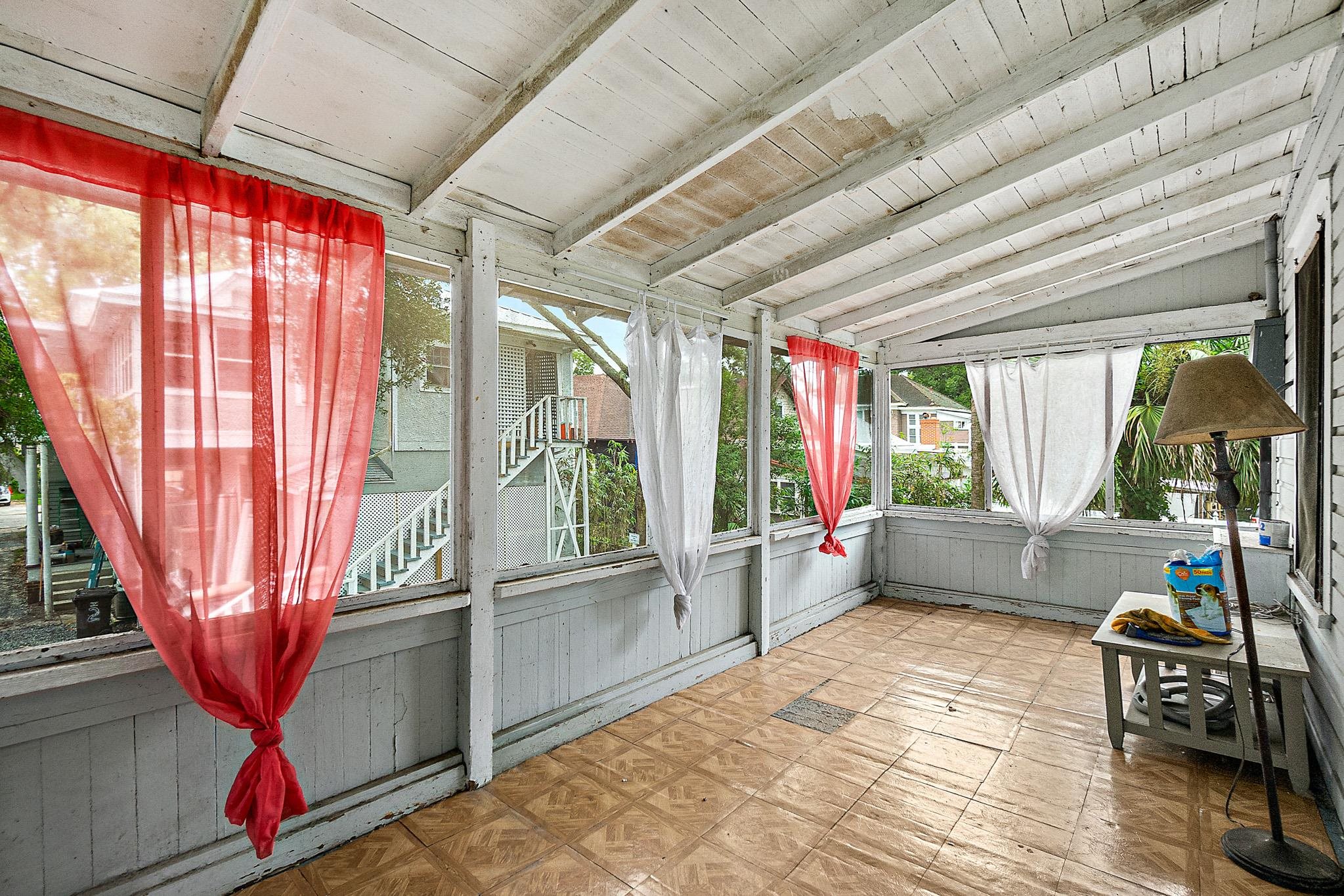 8 Saragossa Street St. Augustine, FL 32084 - Photo 31 of 38 a living room with furniture next to a large window