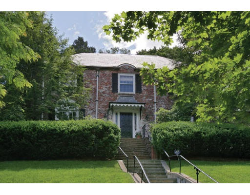 82 Buckminster Road Brookline, MA 02445 - Photo 1 of 1 a front view of a house with a yard
