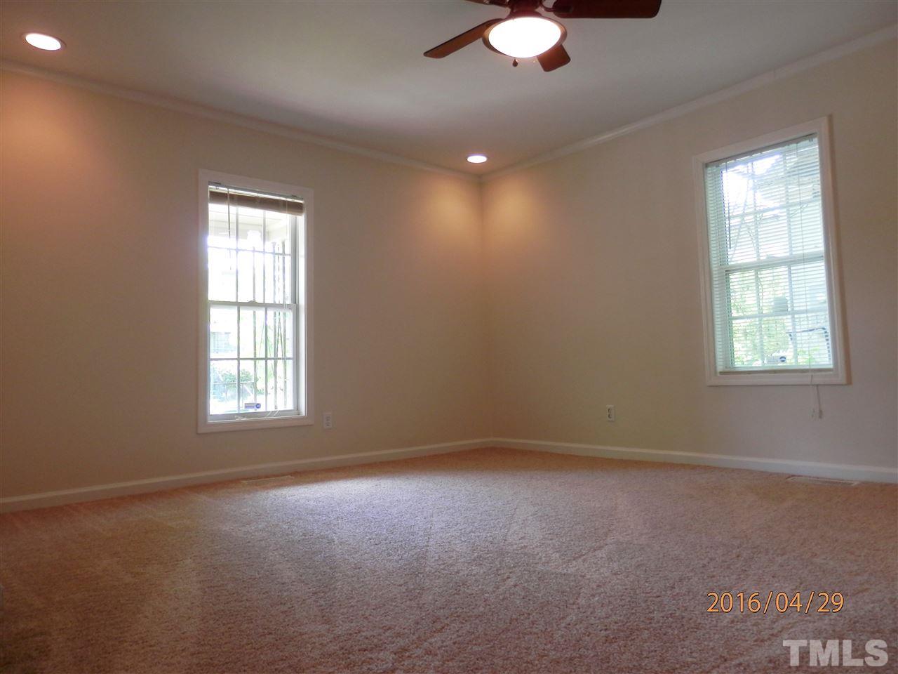 817 East Davie Street Raleigh, NC 27601 - Photo 14 of 25 an empty room with a window