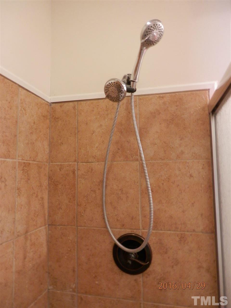 817 East Davie Street Raleigh, NC 27601 - Photo 18 of 25 a bathroom with a shower