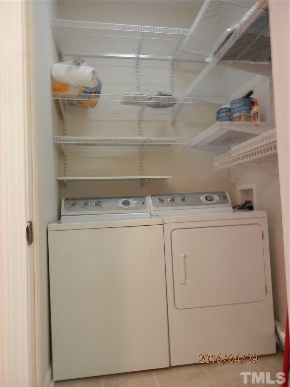 817 East Davie Street Raleigh, NC 27601 - Photo 20 of 25 a utility room with washer and dryer
