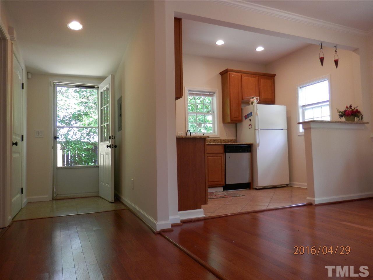 817 East Davie Street Raleigh, NC 27601 - Photo 3 of 25 a view of kitchen with furniture and wooden floor