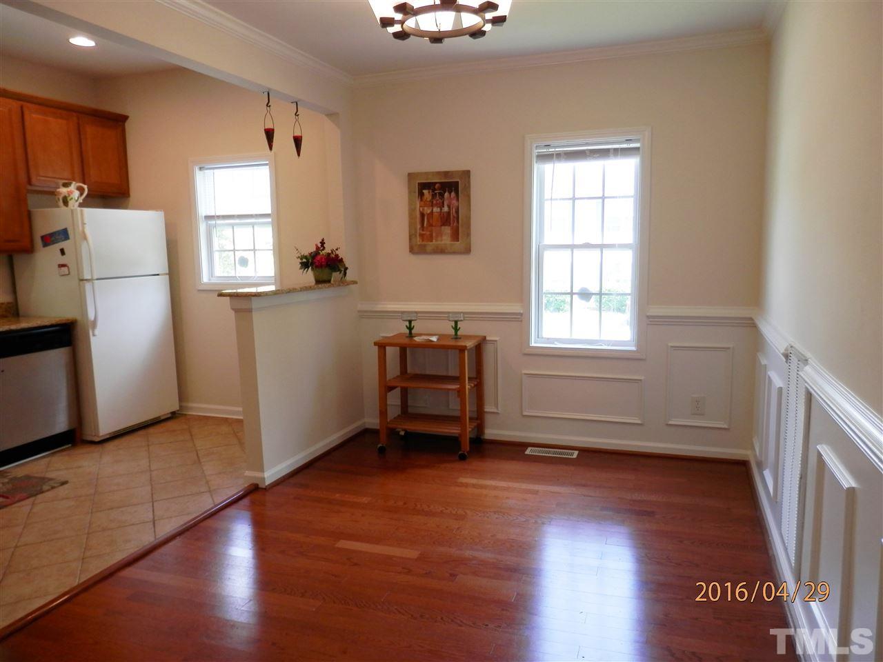 817 East Davie Street Raleigh, NC 27601 - Photo 5 of 25 a room with furniture and a window