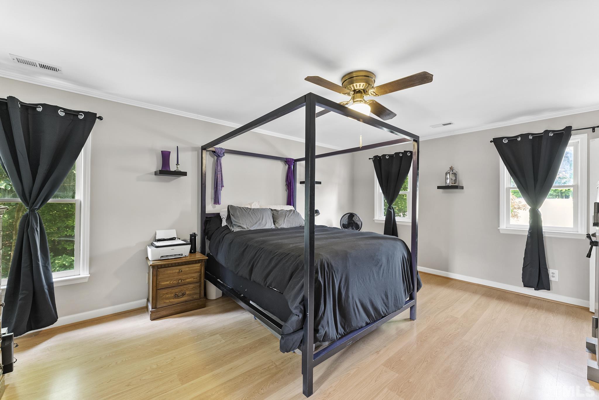 524 Jericho Road Hillsborough, NC 27278 - Photo 17 of 52 a bedroom with a bed window and a flat screen tv