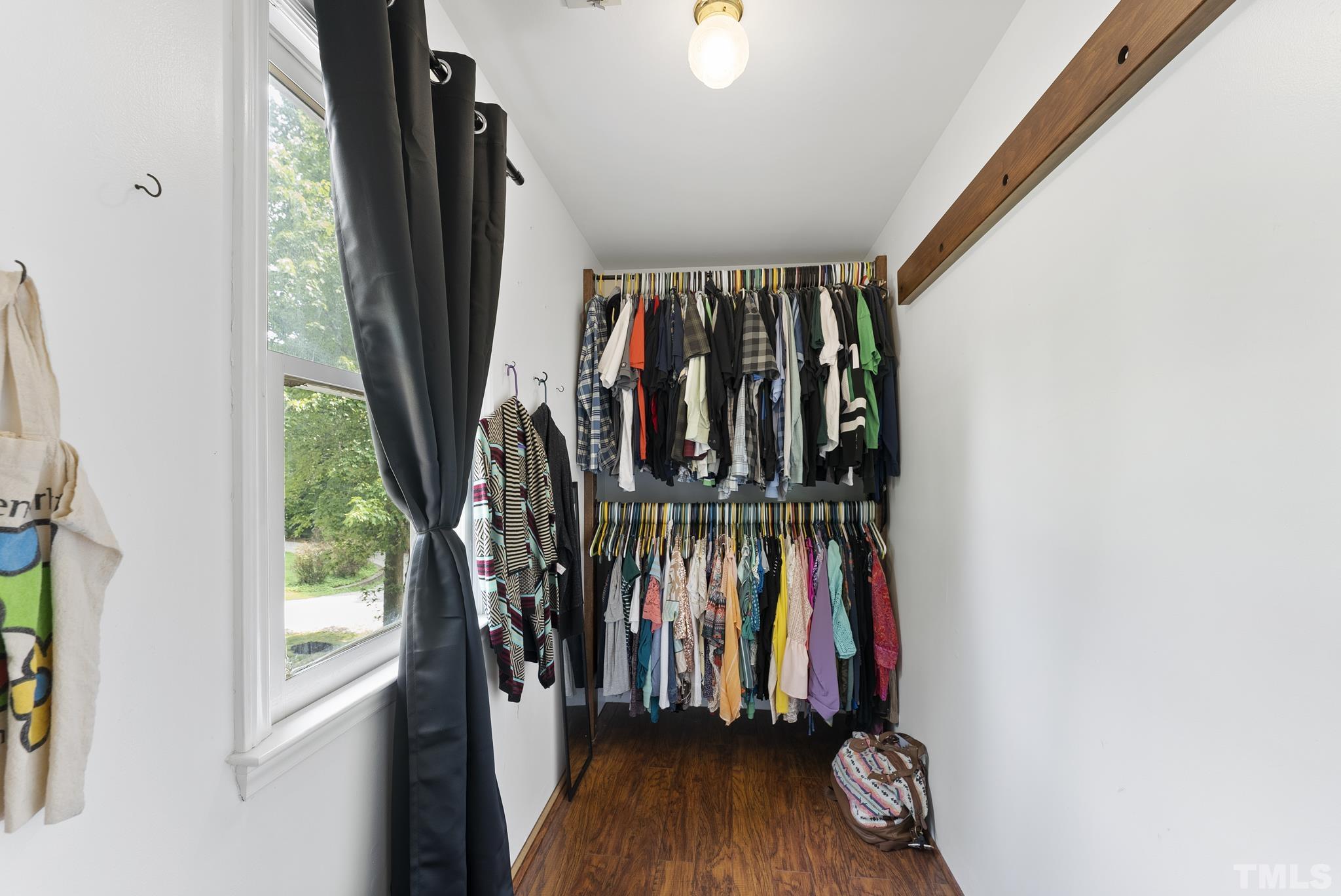 524 Jericho Road Hillsborough, NC 27278 - Photo 21 of 52 a view of walk in closet with clothes and shoes