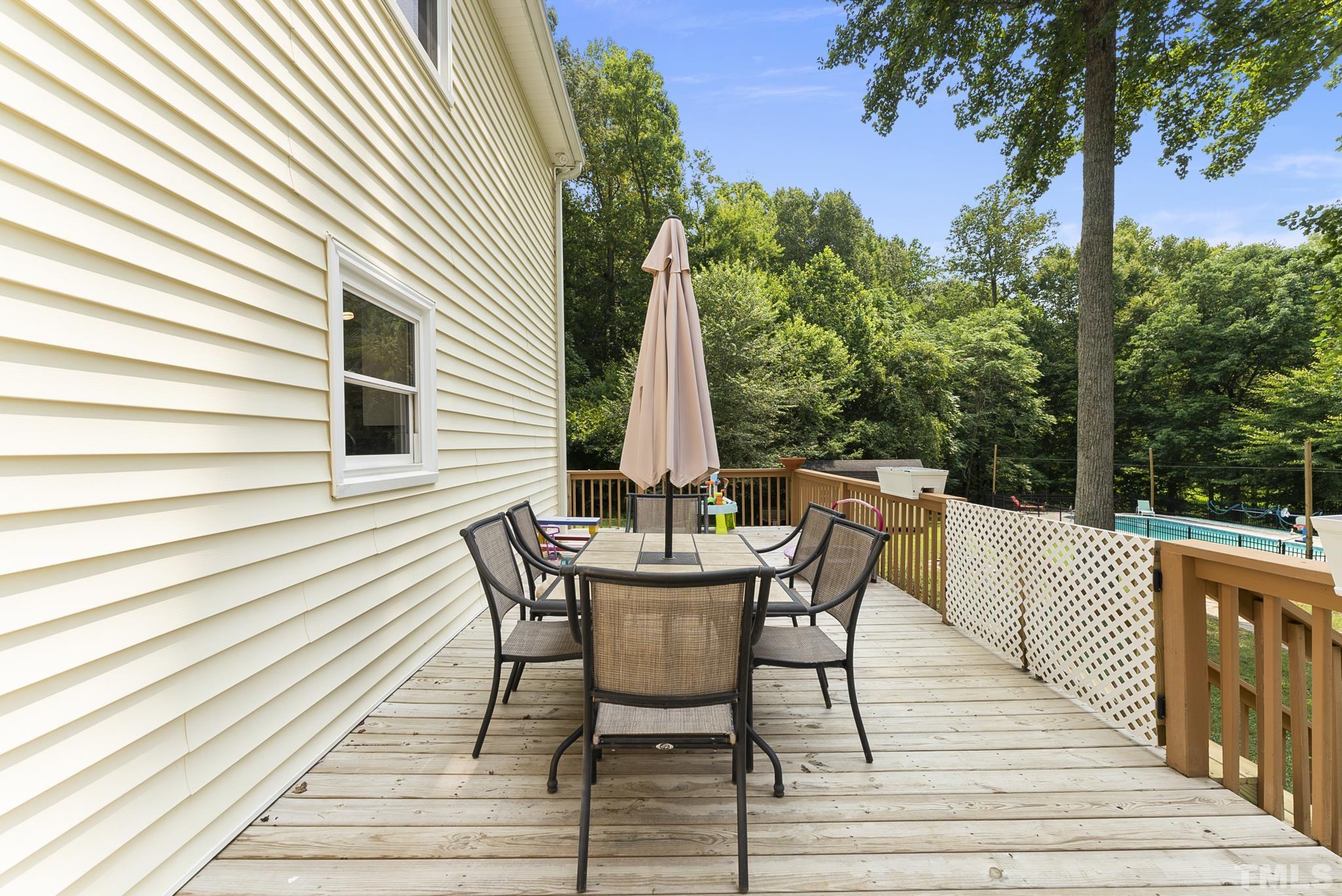 524 Jericho Road Hillsborough, NC 27278 - Photo 33 of 52 a view of a patio with a table and chairs