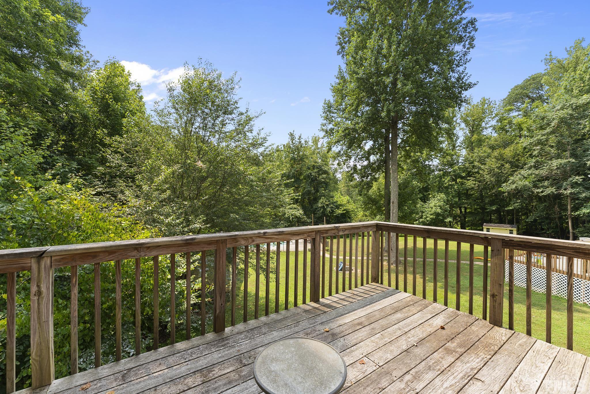 524 Jericho Road Hillsborough, NC 27278 - Photo 36 of 52 a balcony with wooden floor and fence