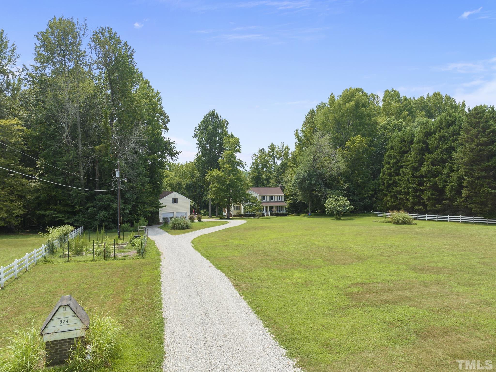 524 Jericho Road Hillsborough, NC 27278 - Photo 52 of 52 a view of a swimming pool with a yard