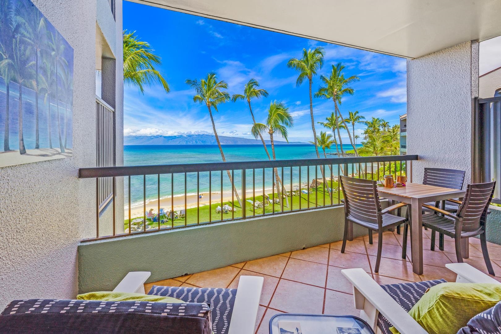 3875 Lower Honoapiilani Road, Unit B305 Lahaina, HI 96761 - Photo 13 of 35 a view of a chairs and table in patio