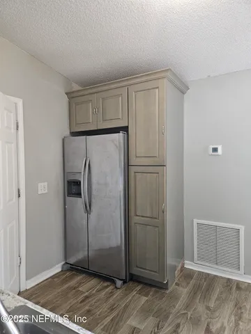 a view of a hallway with entryway