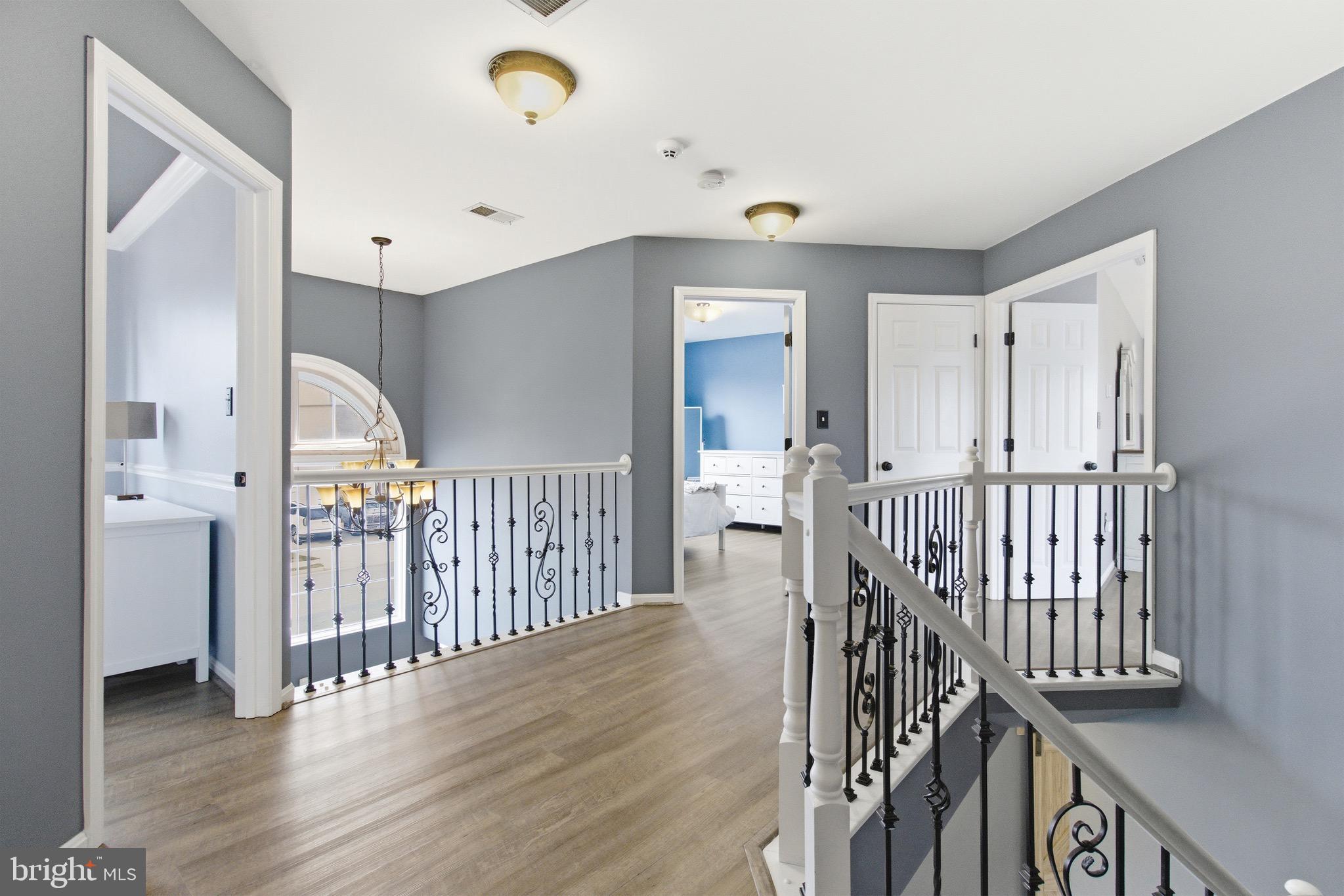 720 Vista Ridge Drive Northeast Leesburg, VA 20176 - Photo 18 of 61 Upper Level hallway - all new LVP flooring 2021