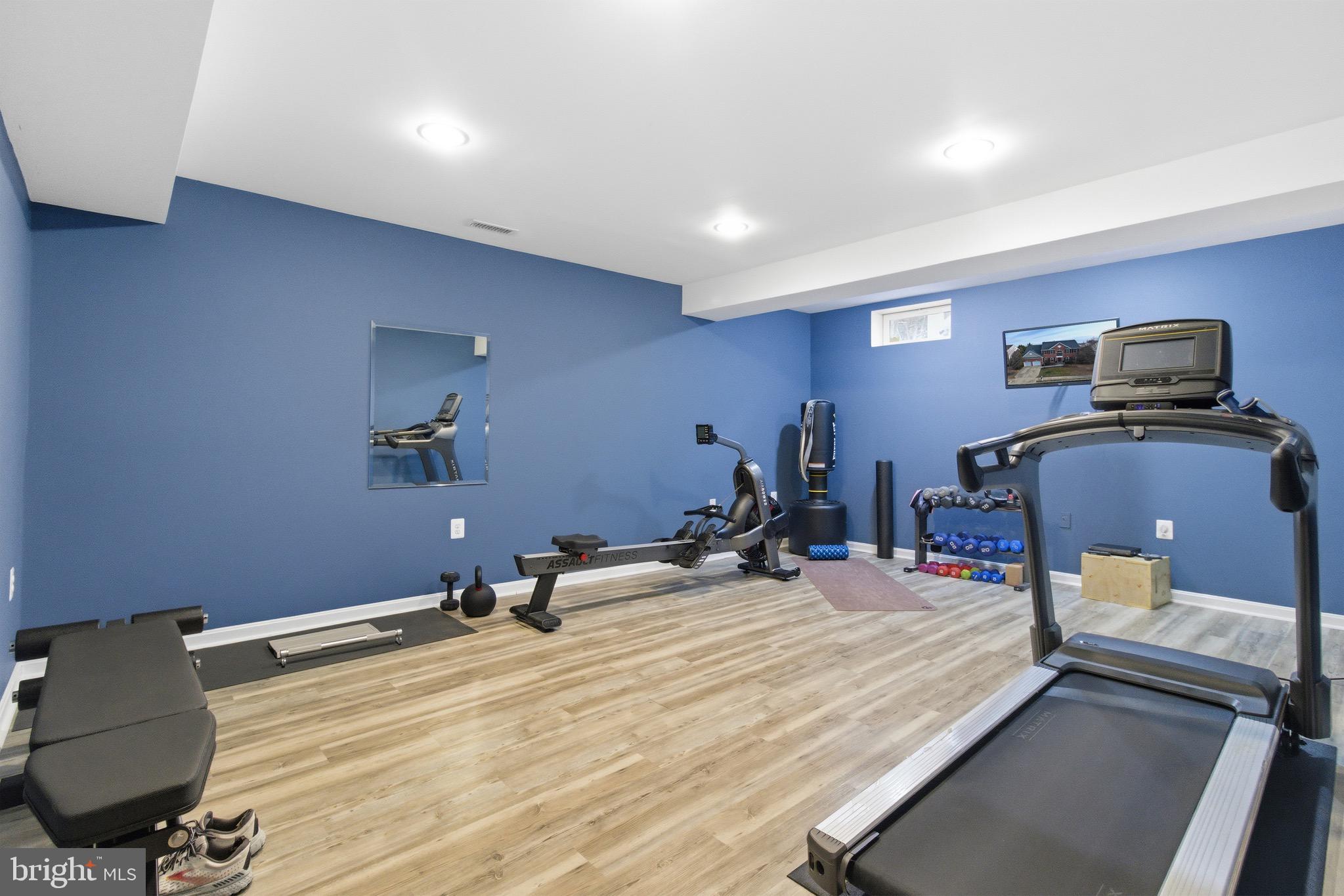 720 Vista Ridge Drive Northeast Leesburg, VA 20176 - Photo 30 of 61 Lower level exercise room w/extra floor padding