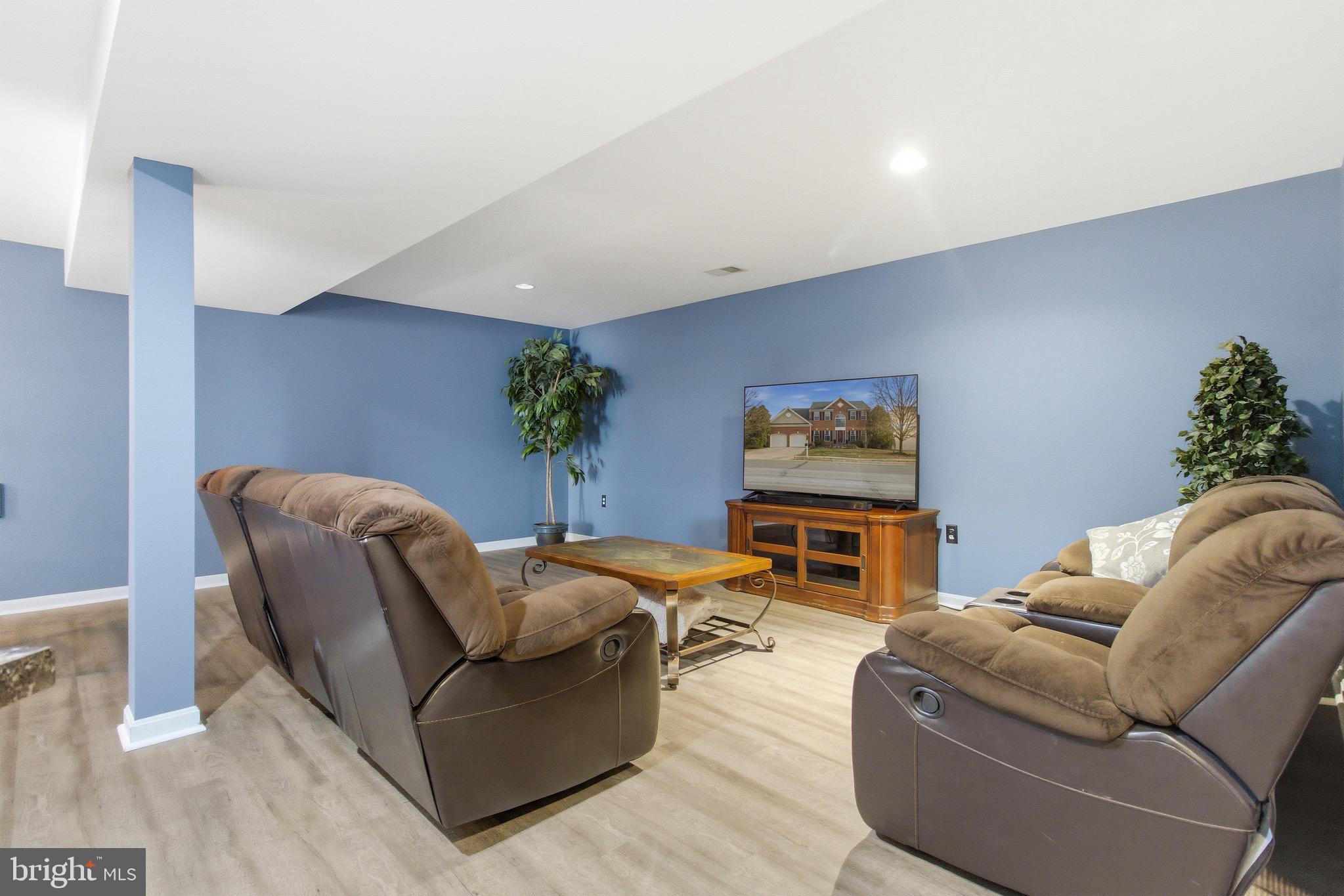 720 Vista Ridge Drive Northeast Leesburg, VA 20176 - Photo 31 of 61 Lower level recreation area w/recessed lights