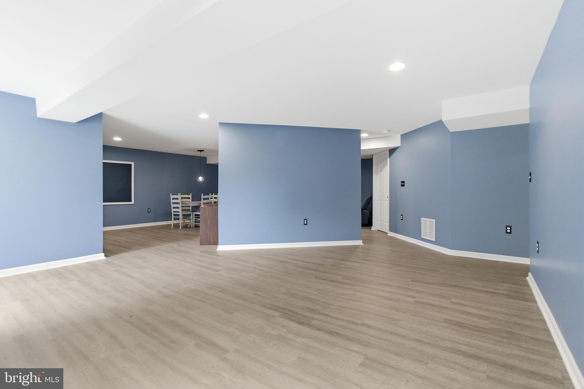 720 Vista Ridge Drive Northeast Leesburg, VA 20176 - Photo 32 of 61 Lower level w/newer LVP and recessed lighting