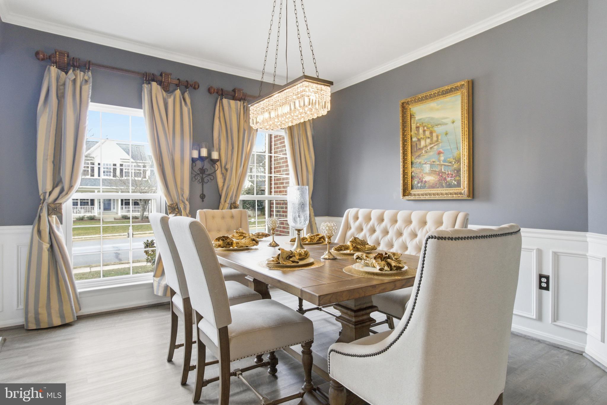 720 Vista Ridge Drive Northeast Leesburg, VA 20176 - Photo 5 of 61 Dining Room w/elegant chandelier & custom drapes