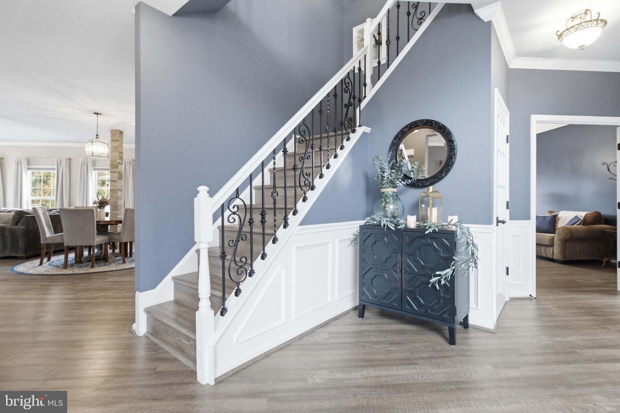 720 Vista Ridge Drive Northeast Leesburg, VA 20176 - Photo 8 of 61 Stair case with updated rod-iron railing