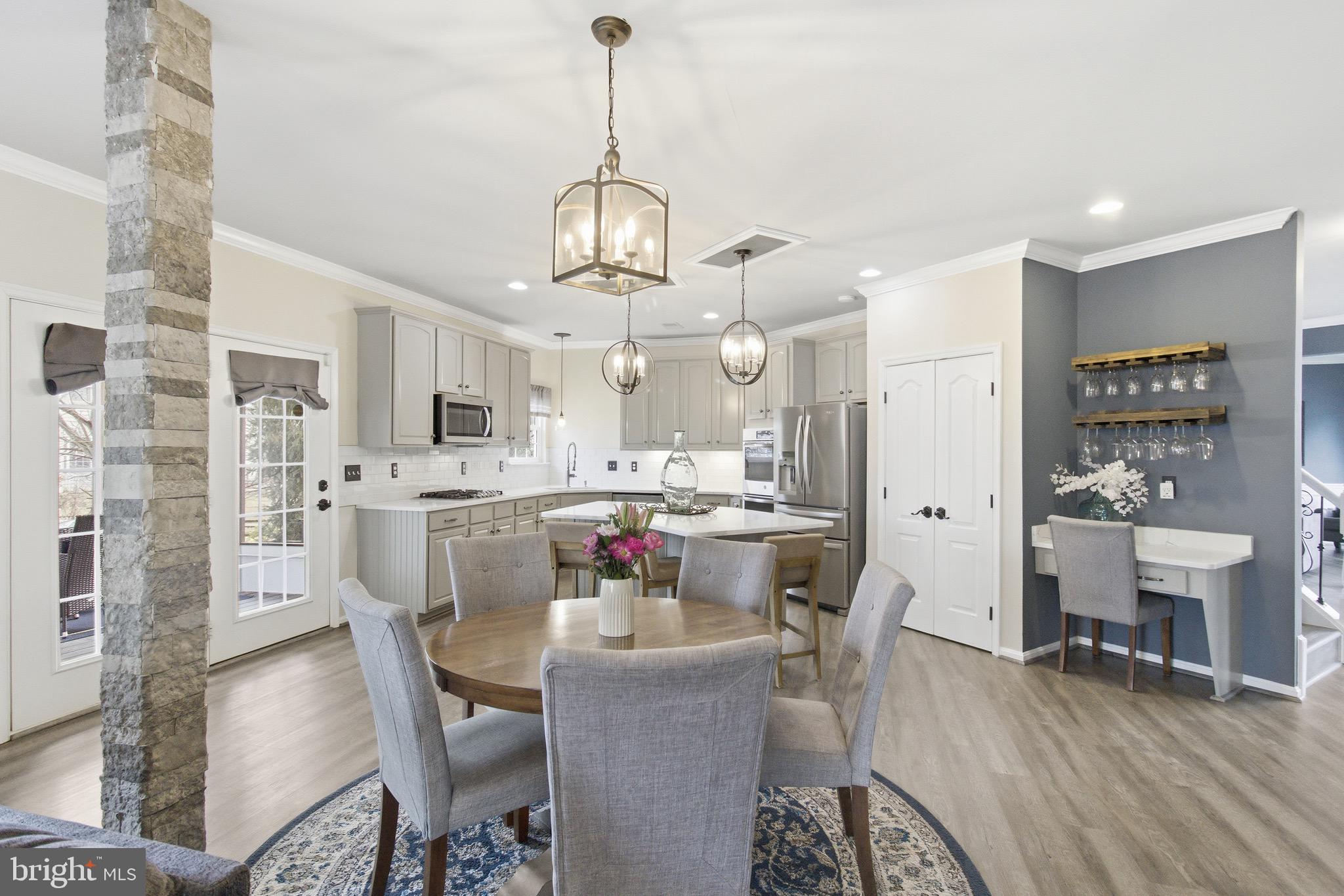 720 Vista Ridge Drive Northeast Leesburg, VA 20176 - Photo 9 of 61 Updated Kitchen w/ glass subway tile backsplace