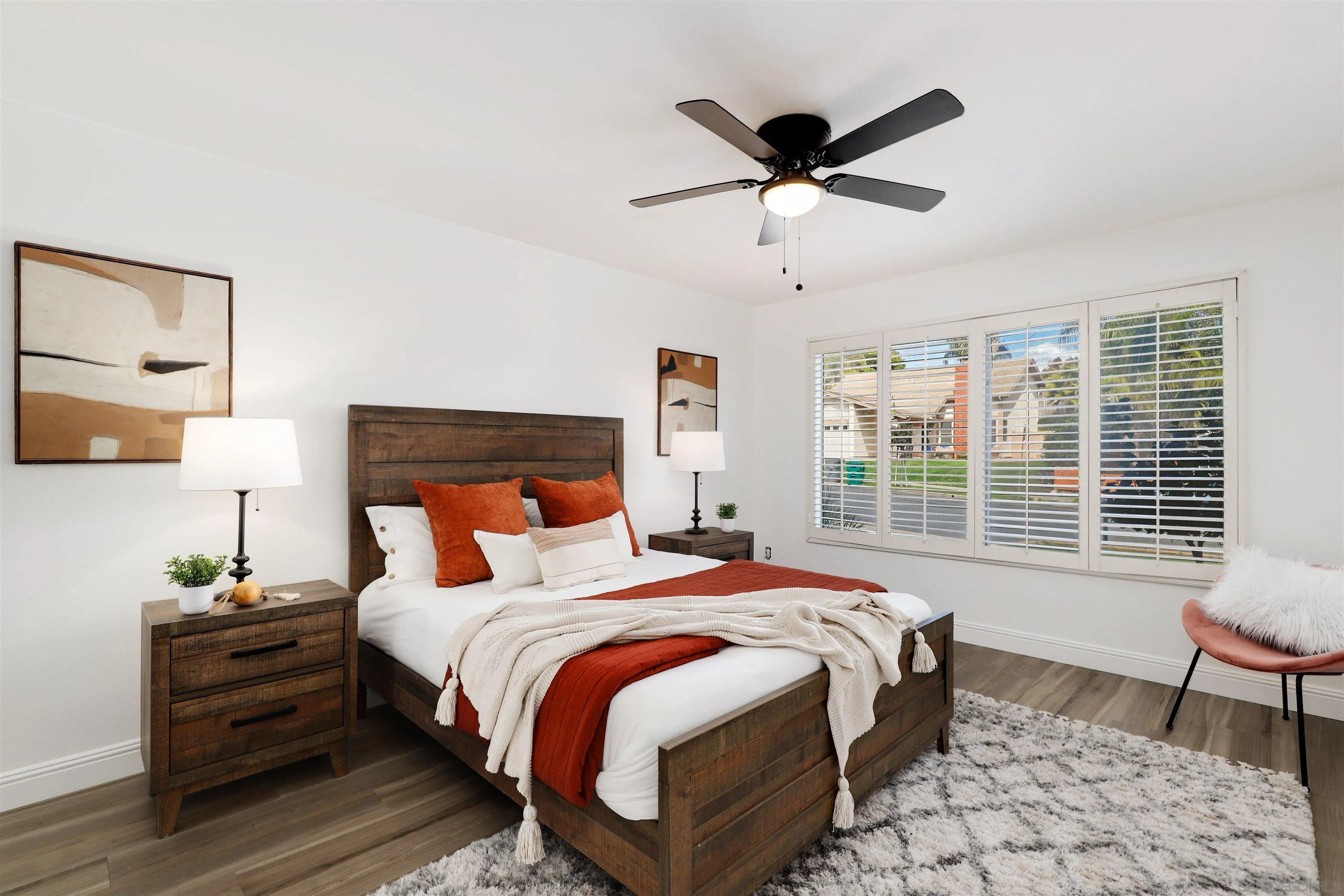 3933 Brown Street Oceanside, CA 92056 - Photo 14 of 25 a bedroom with a bed and a window