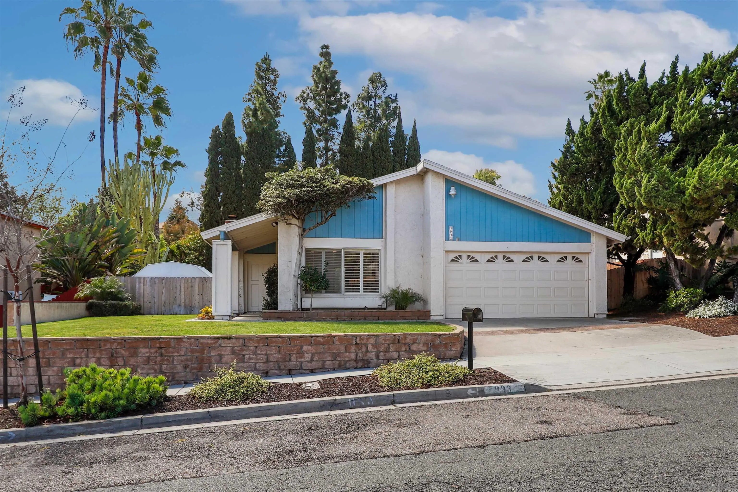 3933 Brown Street Oceanside, CA 92056 - Photo 25 of 25 a front view of house with a garden