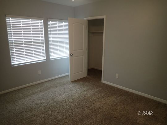 4423 Johnston Avenue Ridgecrest, CA 93555 - Photo 12 of 14 a view of an empty room with a window