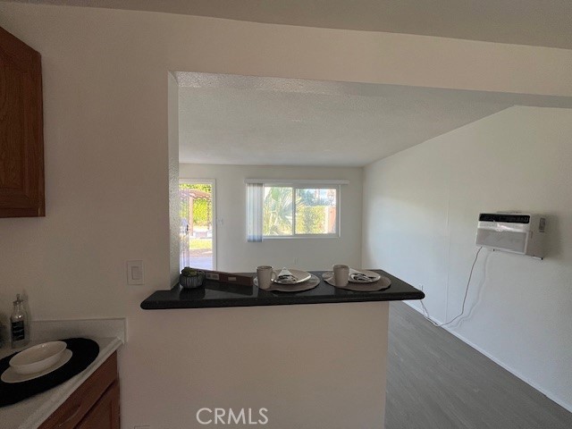 37067 Bankside Drive, Unit B Cathedral City, CA 92234 - Photo 11 of 23 a blue and white kitchen with a sink