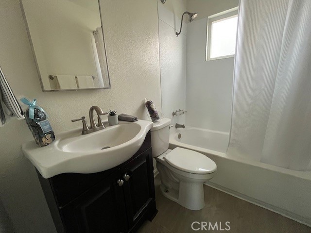 37067 Bankside Drive, Unit B Cathedral City, CA 92234 - Photo 14 of 23 a bathroom with a sink toilet mirror and shower