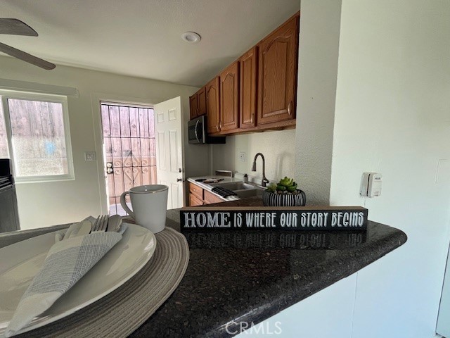 37067 Bankside Drive, Unit B Cathedral City, CA 92234 - Photo 10 of 23 a bed sitting in a bedroom next to a window