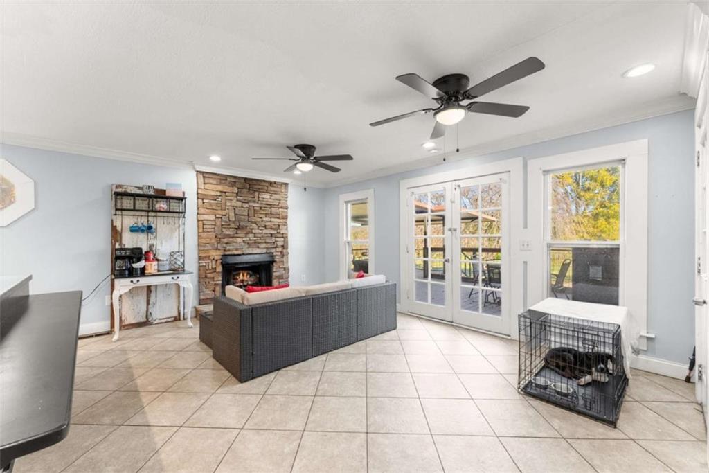 6622 Old Cleveland Road Clermont, GA 30527 - Photo 27 of 69 a living room with furniture and a open kitchen area