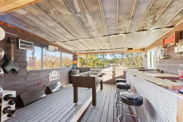 a view of a balcony with car parked