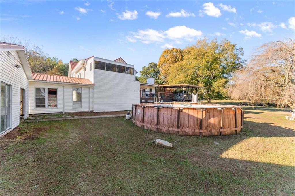 6622 Old Cleveland Road Clermont, GA 30527 - Photo 49 of 69 a view of a house with backyard and sitting area