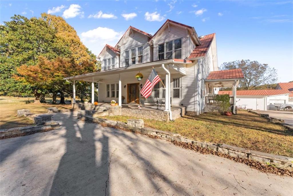 6622 Old Cleveland Road Clermont, GA 30527 - Photo 6 of 69 a front view of a house with a yard