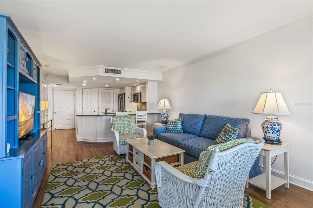 5000 Gasparilla Road, Unit BC204 Boca Grande, FL 33921 - Photo 7 of 36 a living room with furniture and a flat screen tv