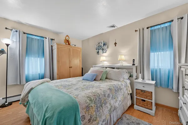 a bedroom with a bed and a closet