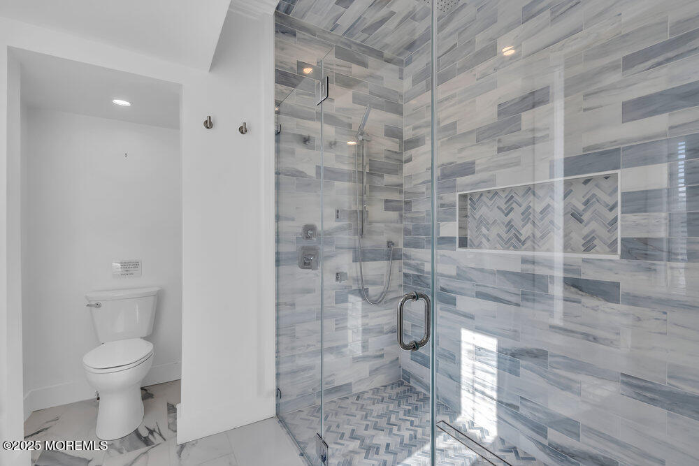 1200 Sunset Avenue Asbury Park, NJ 07712 - Photo 22 of 57 a bathroom with a toilet and a shower
