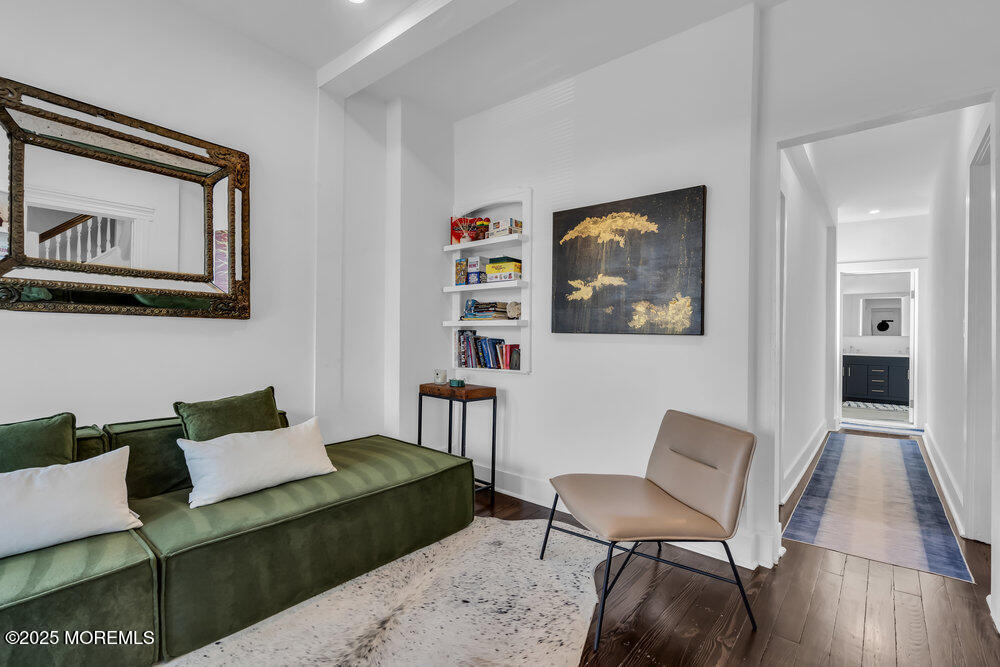 1200 Sunset Avenue Asbury Park, NJ 07712 - Photo 3 of 57 a living room with furniture and a painting on the wall