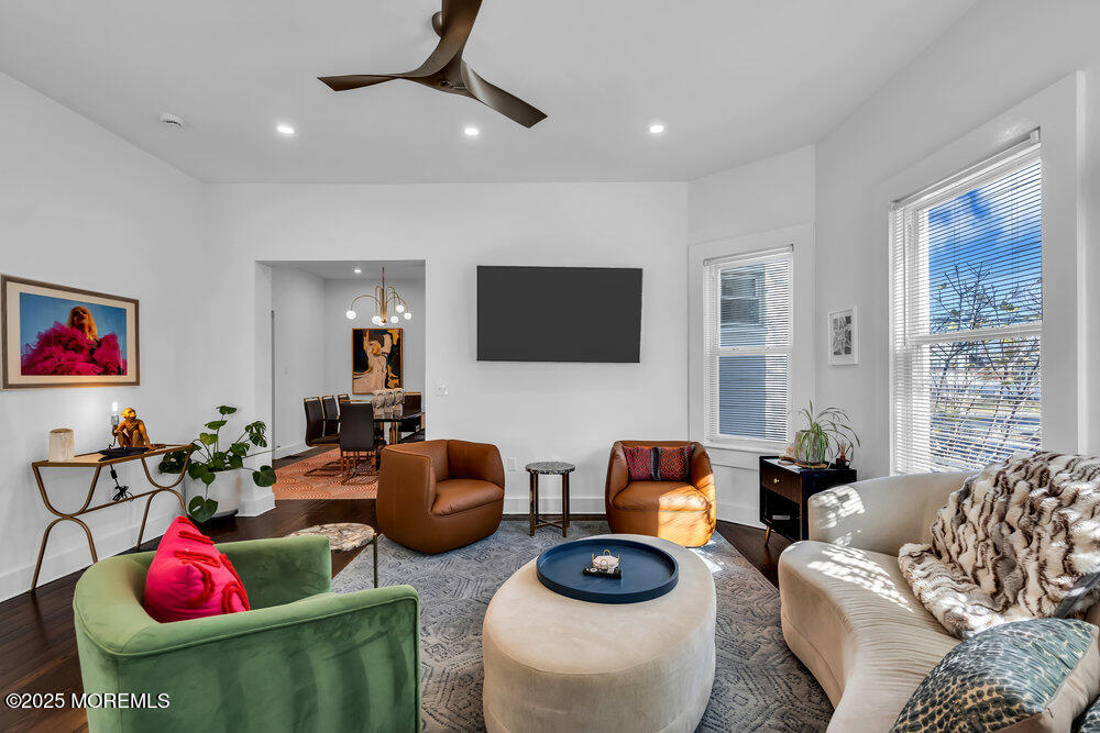 1200 Sunset Avenue Asbury Park, NJ 07712 - Photo 44 of 57 a living room with furniture a flat screen tv and a window