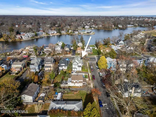 a view of a street with a building in the background
