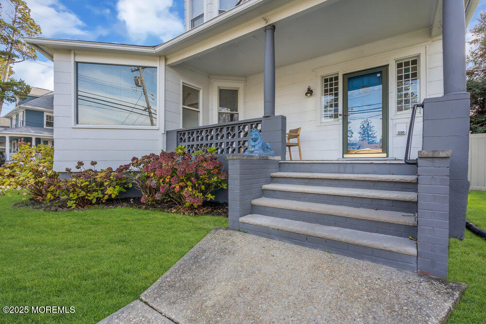 1200 Sunset Avenue Asbury Park, NJ 07712 - Photo 56 of 57 a front view of a house with a garden