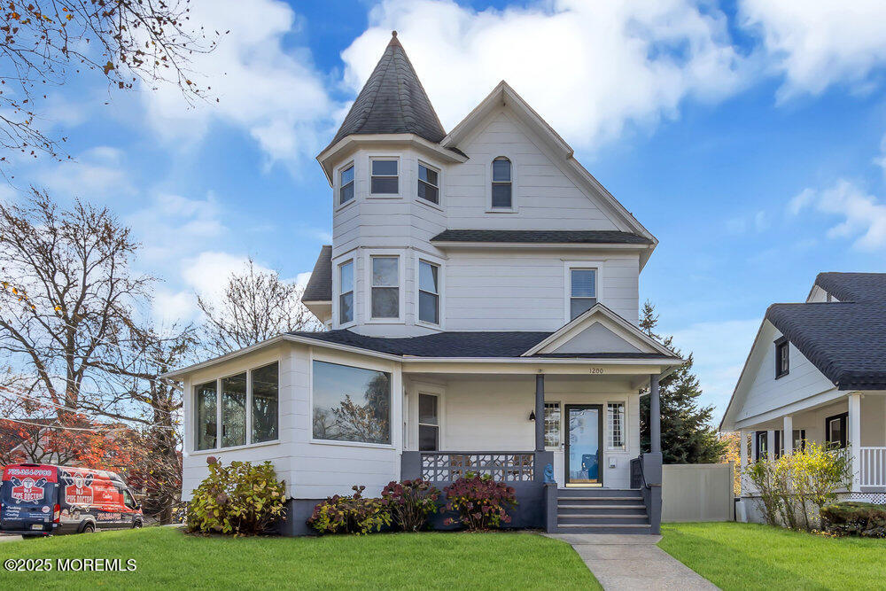 1200 Sunset Avenue Asbury Park, NJ 07712 - Photo 9 of 57 a front view of a house with a garden and plants