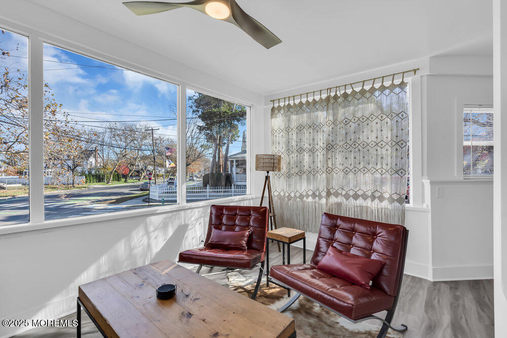 1200 Sunset Avenue Asbury Park, NJ 07712 - Photo 10 of 57 a living room with furniture and a floor to ceiling window