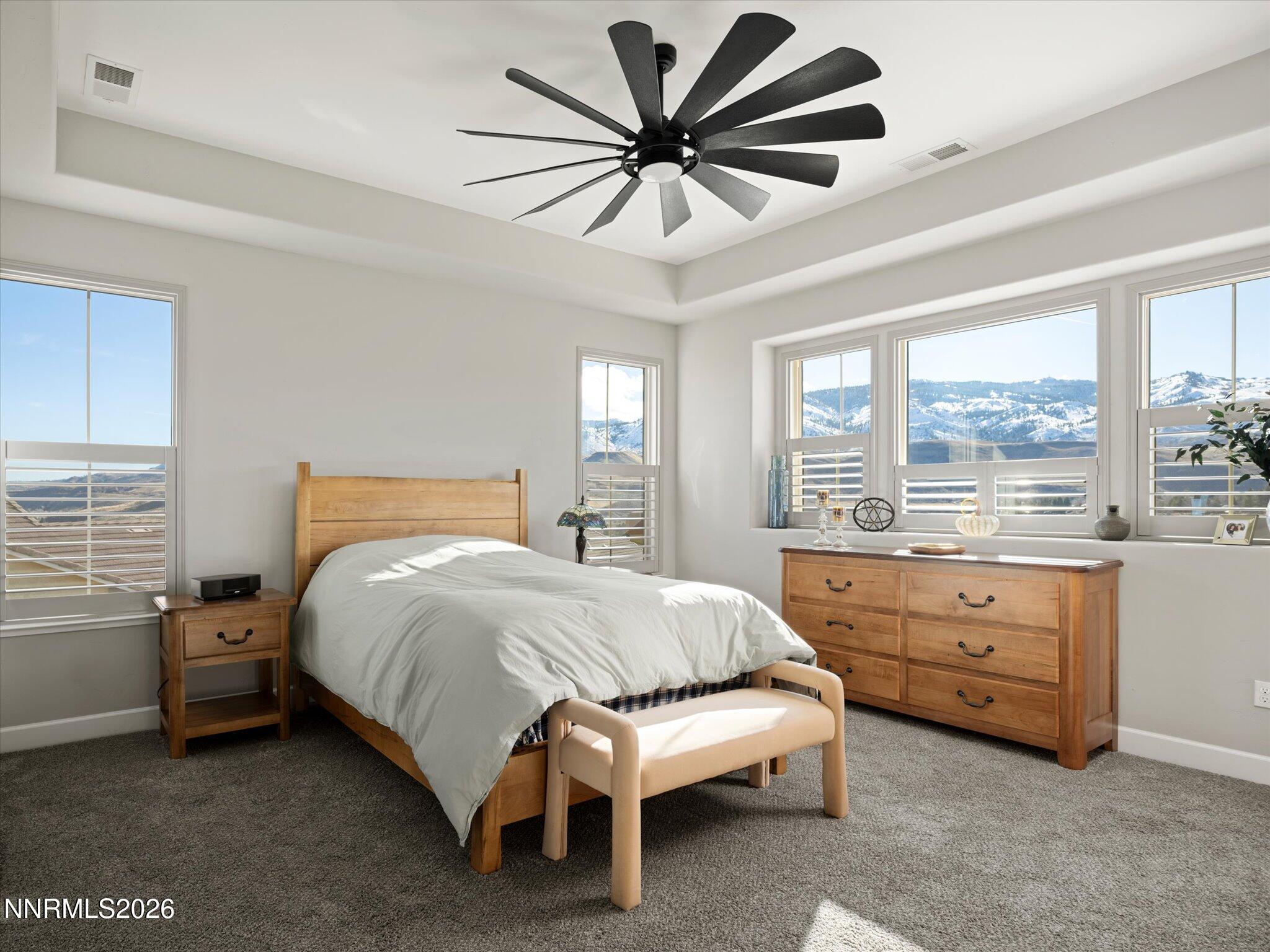 415 Gooseberry Drive Reno, NV 89523 - Photo 15 of 32 a bed room with a bed and a window