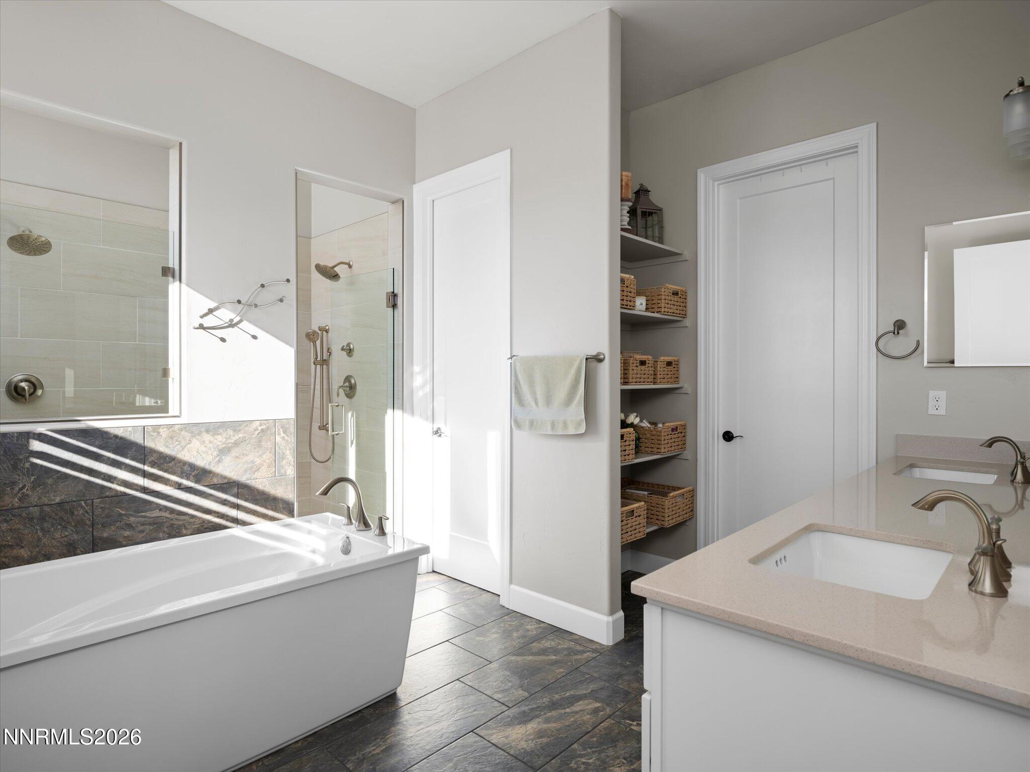 415 Gooseberry Drive Reno, NV 89523 - Photo 18 of 32 a bathroom with a tub sink and a mirror