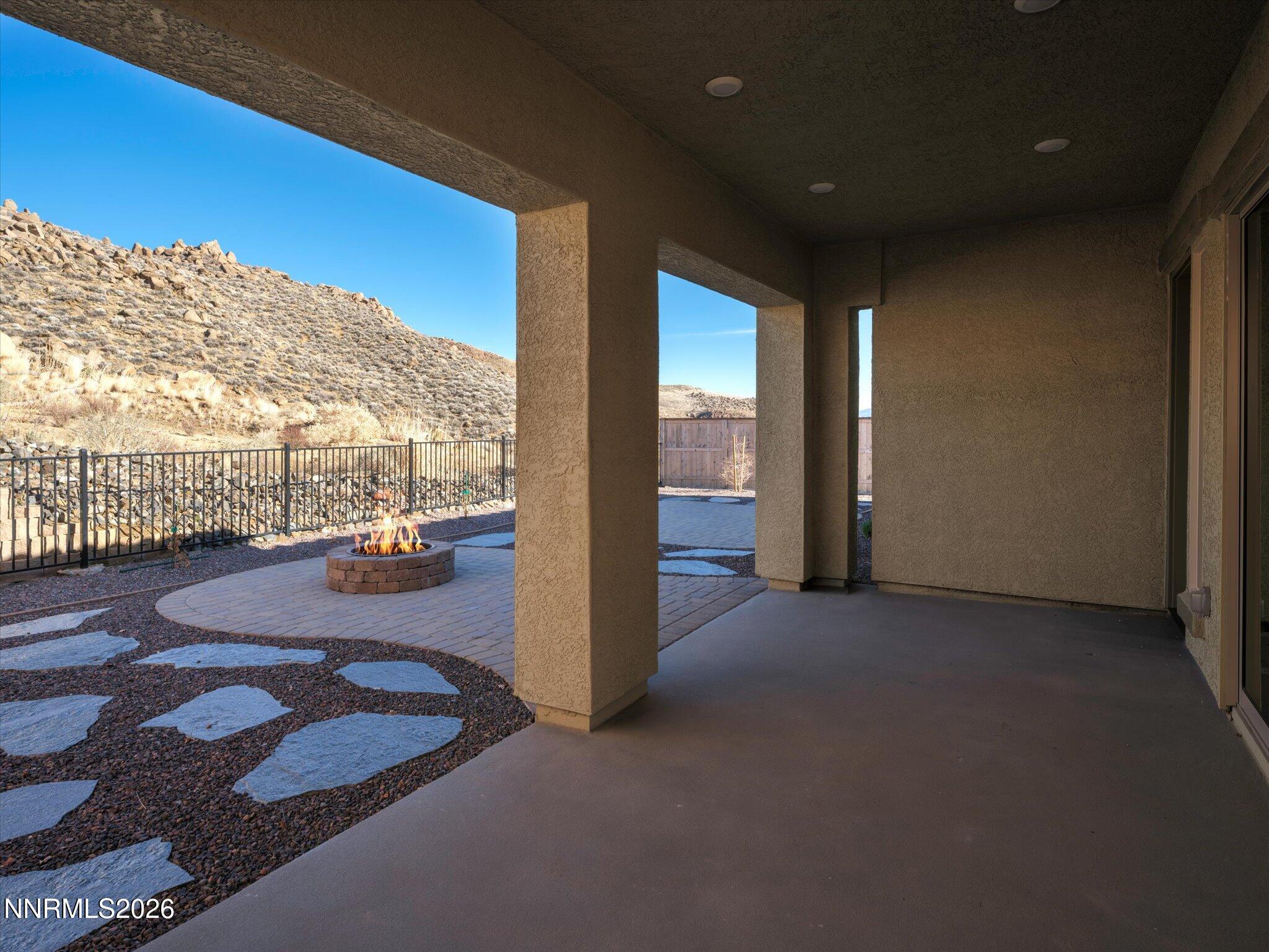 415 Gooseberry Drive Reno, NV 89523 - Photo 22 of 32 a view of a living room and floor to ceiling window