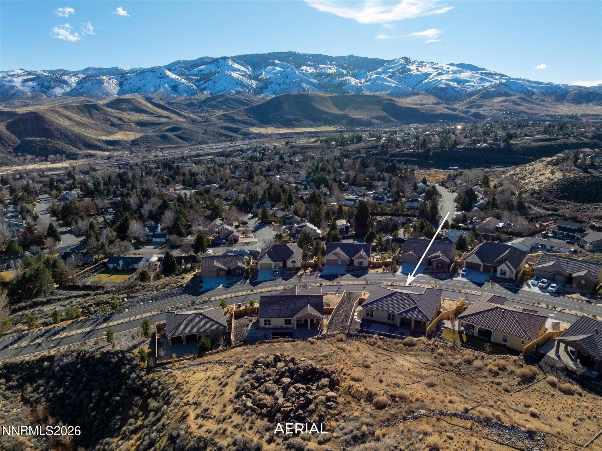 415 Gooseberry Drive Reno, NV 89523 - Photo 3 of 32 an aerial view of a house with a mountain