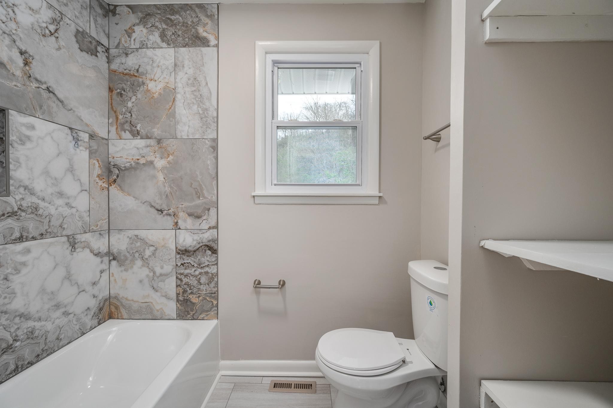 1080 Slaters Creek Road Goodlettsville, TN 37072 - Photo 17 of 22 a bathroom with a toilet and a bathtub