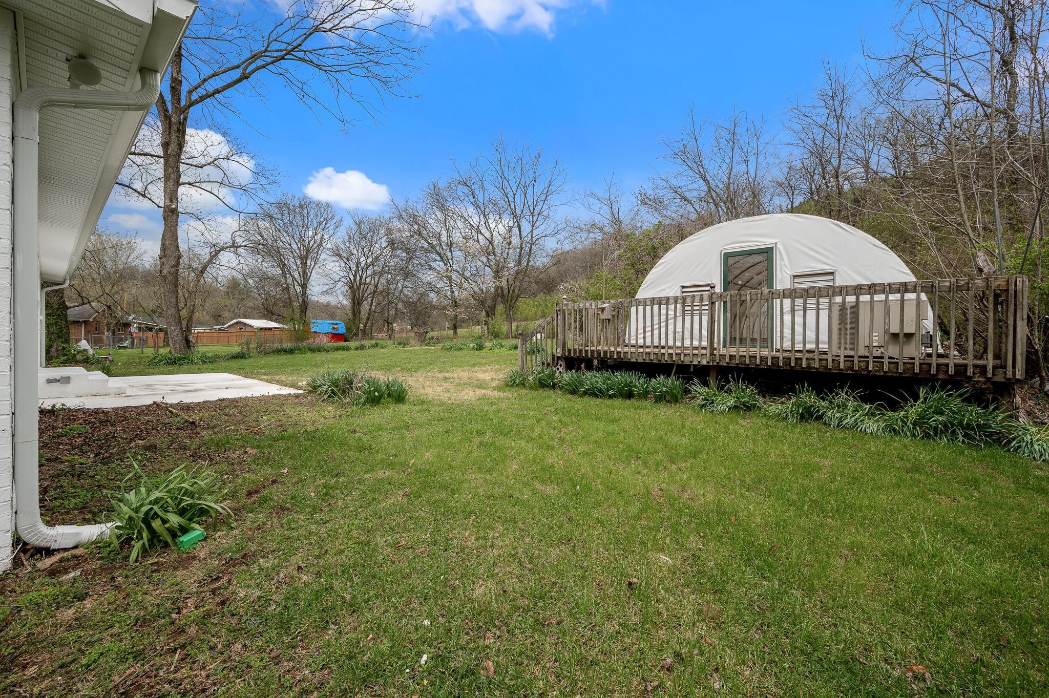 1080 Slaters Creek Road Goodlettsville, TN 37072 - Photo 20 of 22 a view of a house with a yard