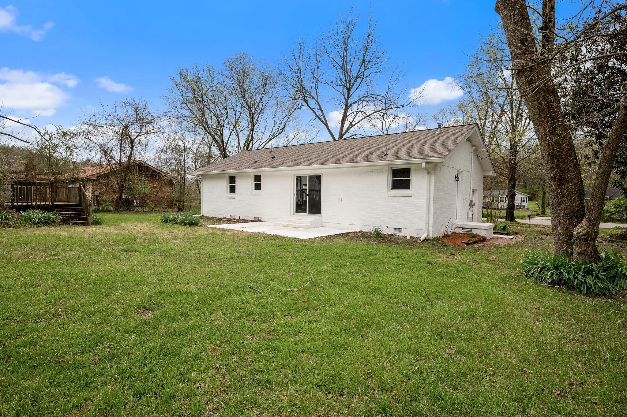 1080 Slaters Creek Road Goodlettsville, TN 37072 - Photo 22 of 22 a view of a house with a yard