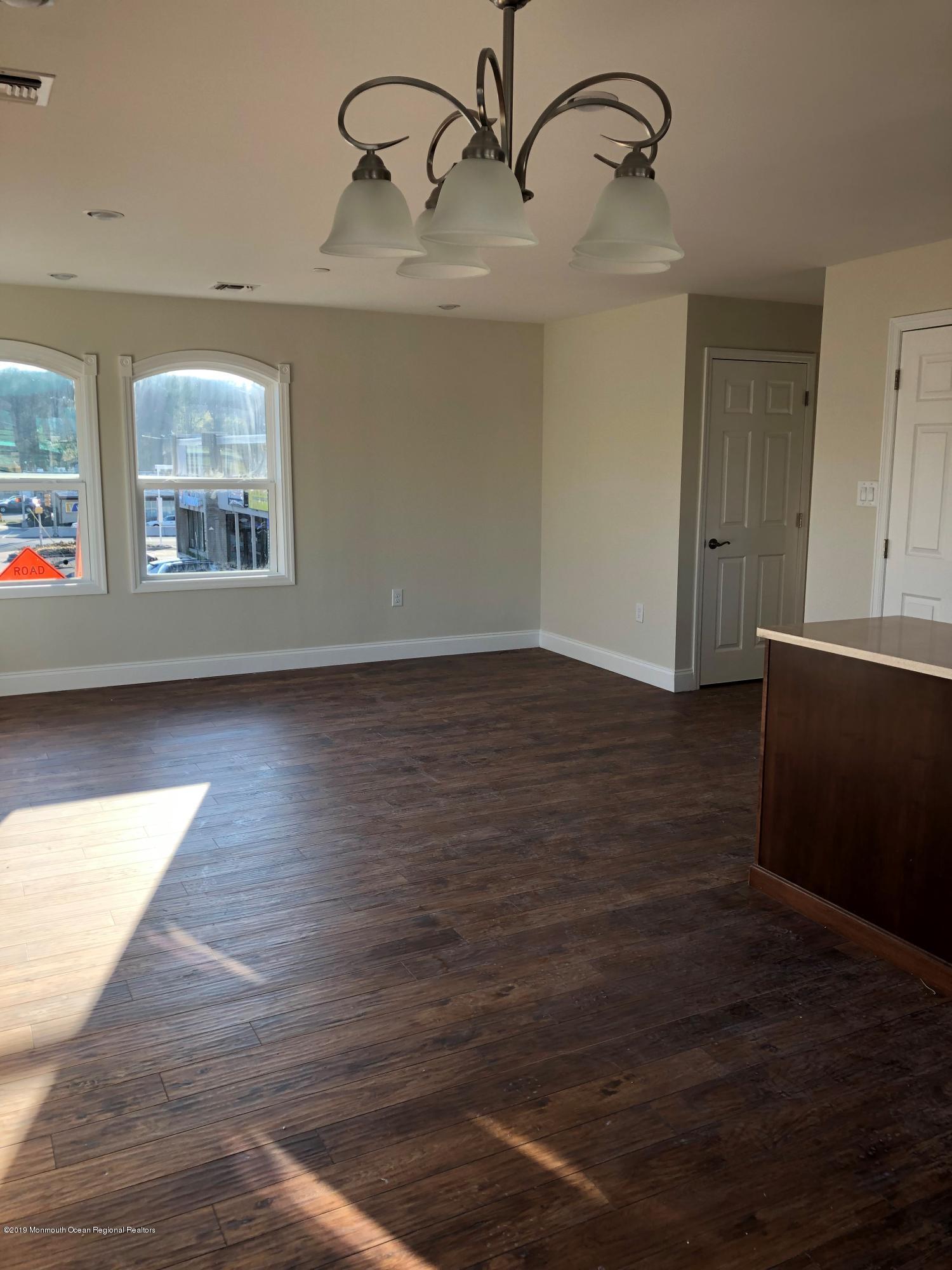 179 First Avenue, Unit B Atlantic Highlands, NJ 07716 - Photo 3 of 3 a view of room with hardwood floor and window
