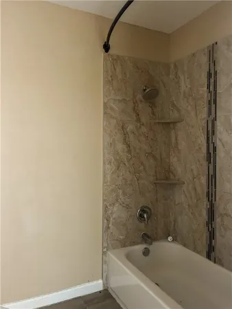 a bathroom with a bathtub